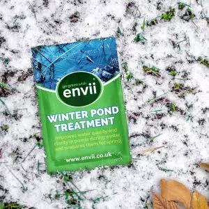 Winter Pond Treatment lifestyle lay on snow